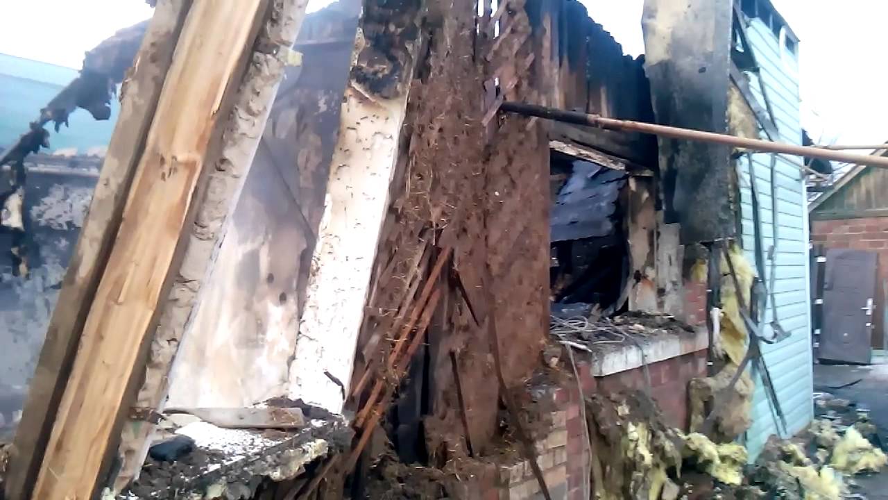 Последствия ночного обстрела градами Горловки