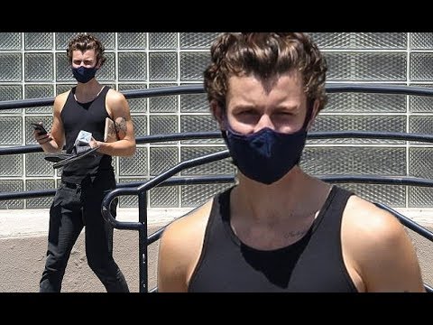 ✅  Shawn Mendes flaunts his stellar biceps in a black racer back tank as he films a top secret video