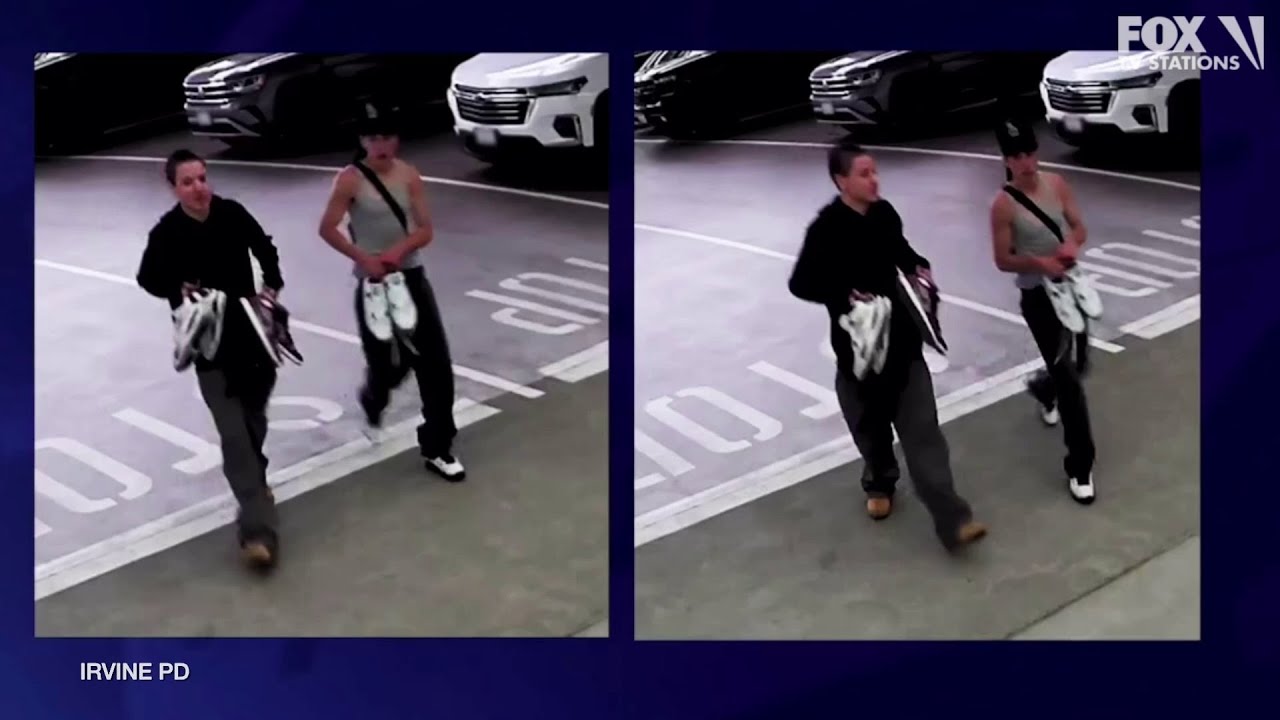 2 suspects follow group into bathroom, rob the victims at gunpoint