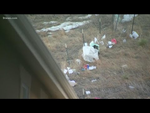 A bunch of trash is blowing into an Arvada neighborhood