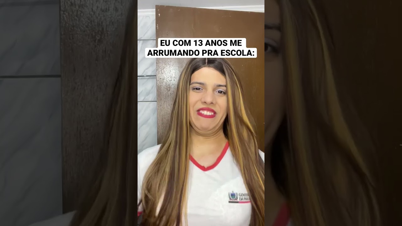 A MENINA SE ARRUMANDO PRA ESCOLA