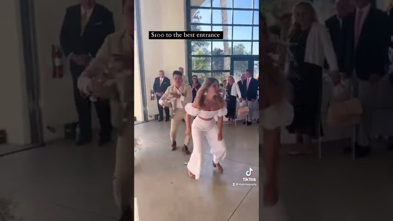 A Wedding Entrance You Won’t Forget 👏👰‍♀️🏈 #wedding #weddingvideo #funnywedding #weddingentrance