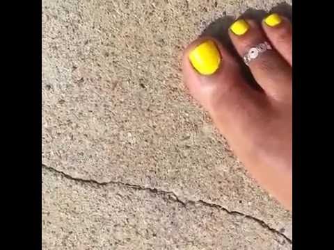 Alexis, toesofalexis crushing little ants with your pretty bare foot, in yellow toe nail