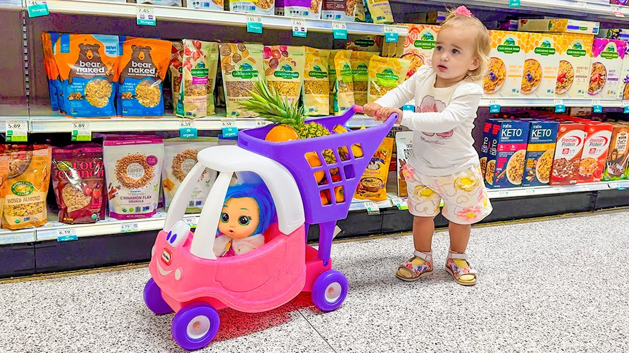 Alice and Baby doll doing shopping in the supermarket