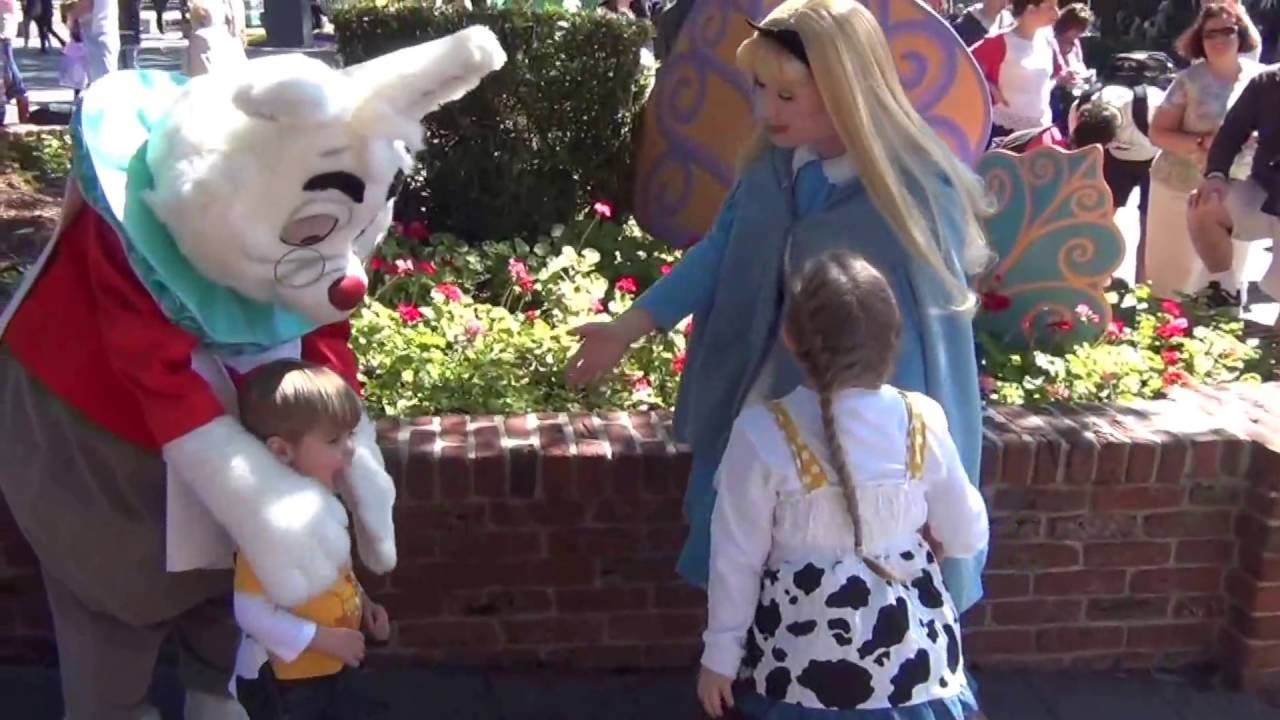 Alice and the White Rabbit meet Kayla and Logan