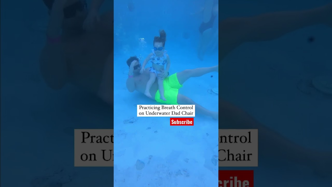Amazing 2 year old, practicing breath control, sitting on underwater Dad Chair! #learntoswim #shorts