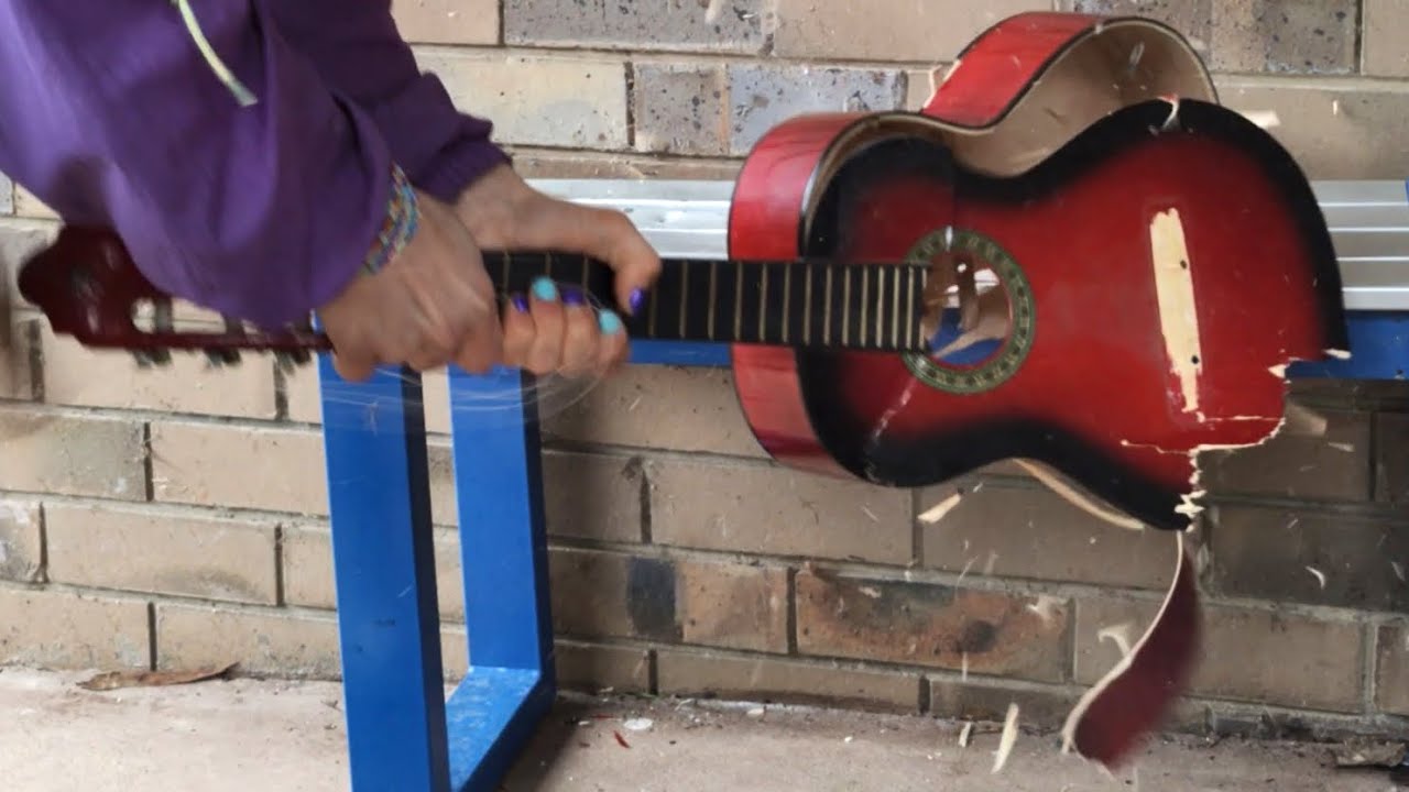Angry Musician Destroys Guitar