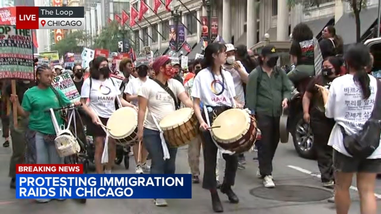 Anti-ICE protesters march through downtown Chicago to oppose immigration raids