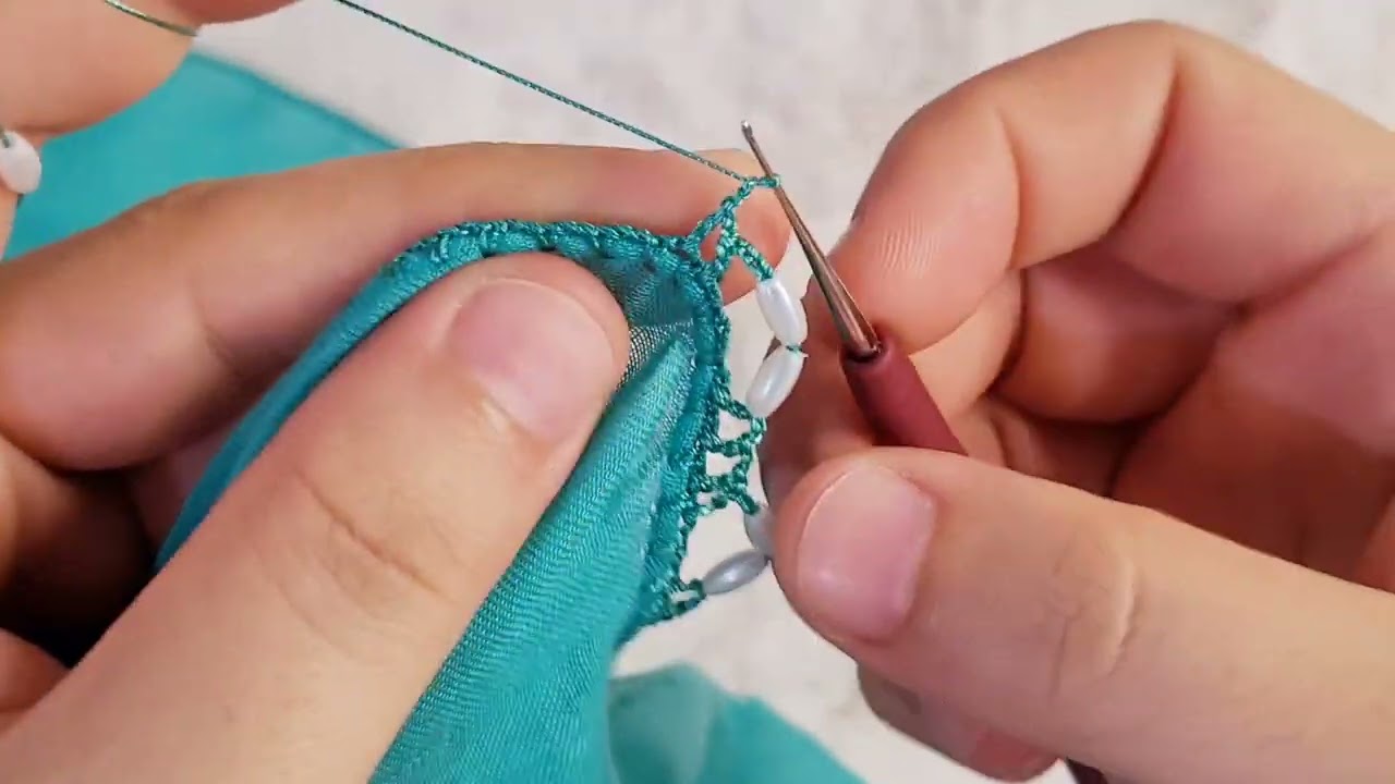 Arpa boncuklu sıralı tığ oyası