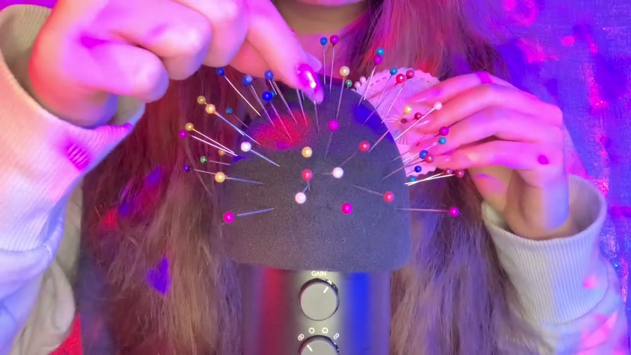 ASMR putting needles on the mic and removing needles from the mic