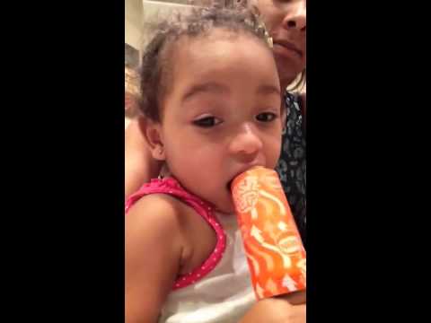 Baby eats push-pop