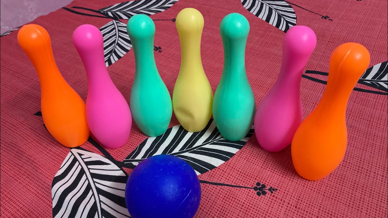 Baby learning colours with bowling toy set
