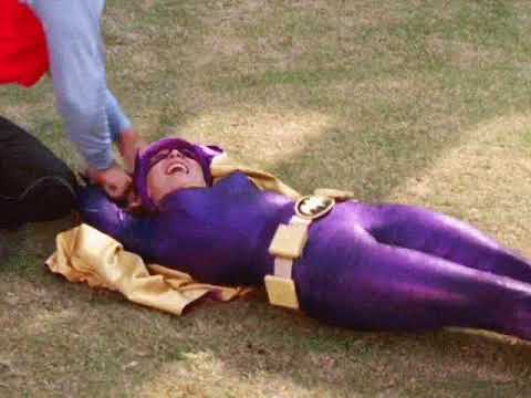 Batgirl captured and manhandled