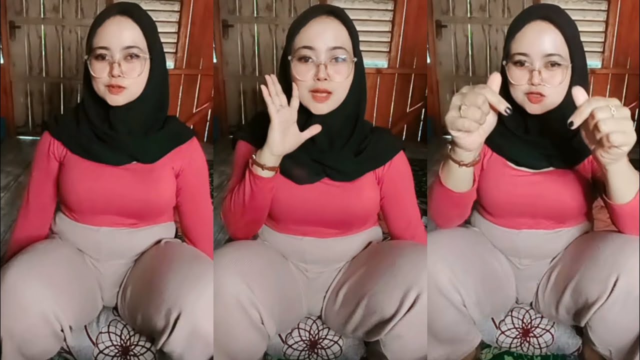 Beautiful sweet natural hijab mother live sitting relaxed on a pillow
