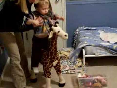 Ben Riding a Giraffe