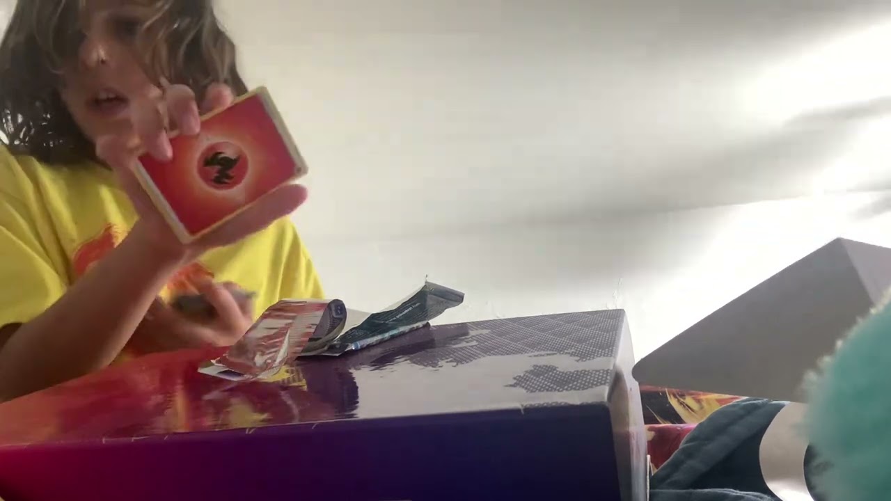 Benny opens the charizard box 📦