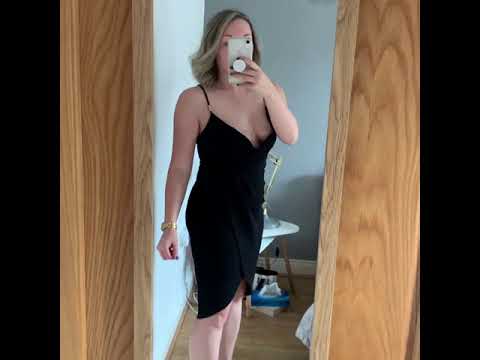 Black wrap midi dress   near downblouse view