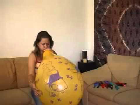 Blow to pop a yellow balloon