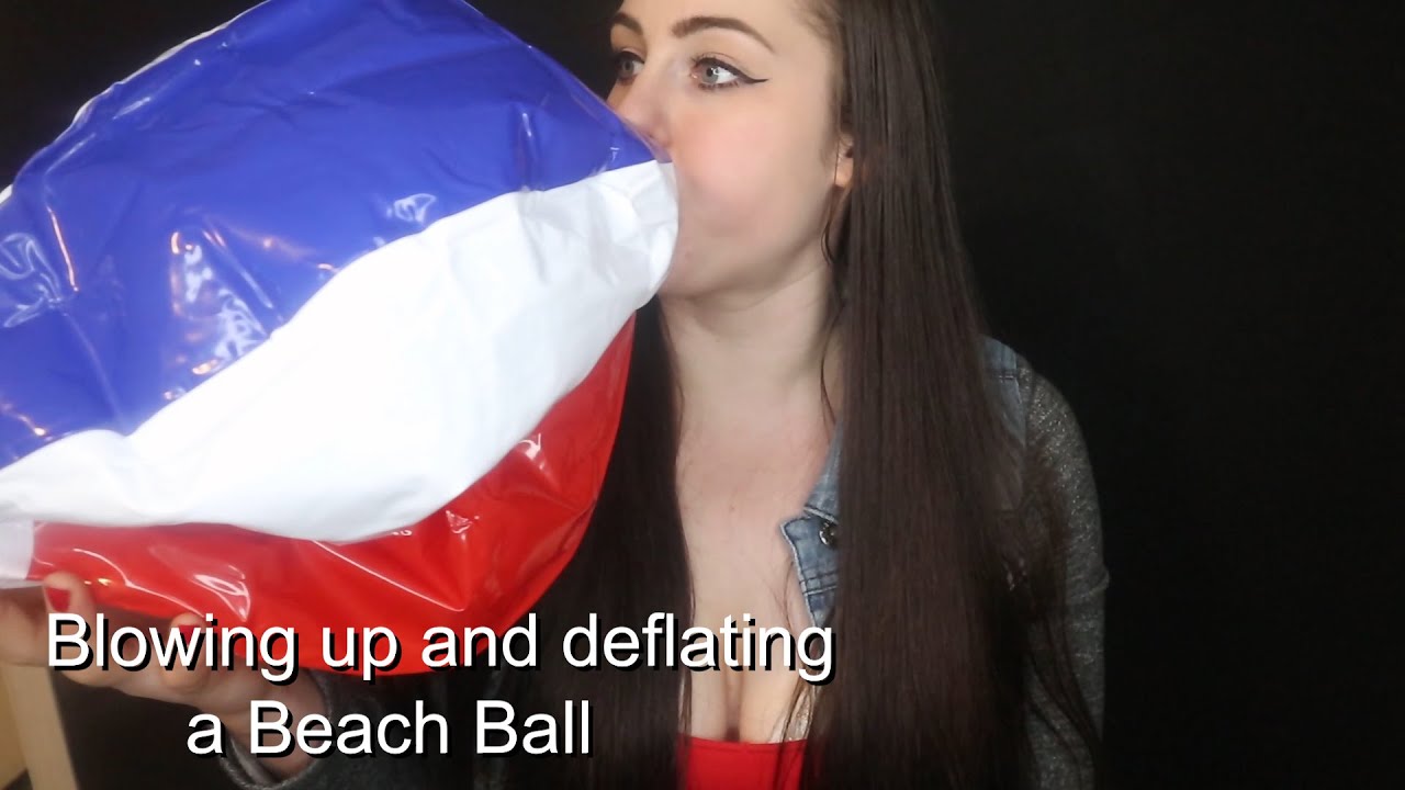 Blowing up a beach ball,
