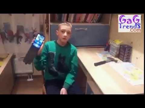 Boy break phone using hammer