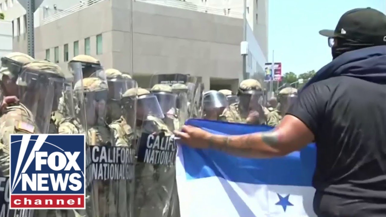 BREAKING: Anti-ICE protesters standoff with National Guard troops in LA