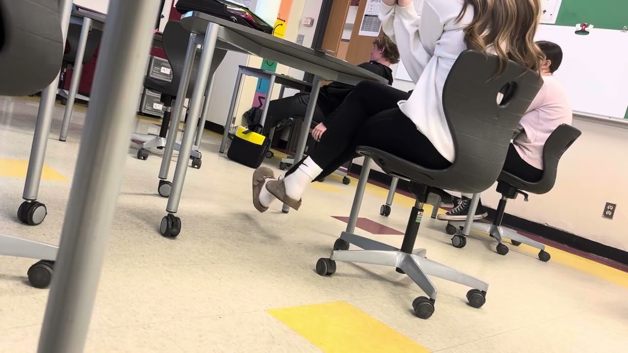 Candid clog shoeplay in school