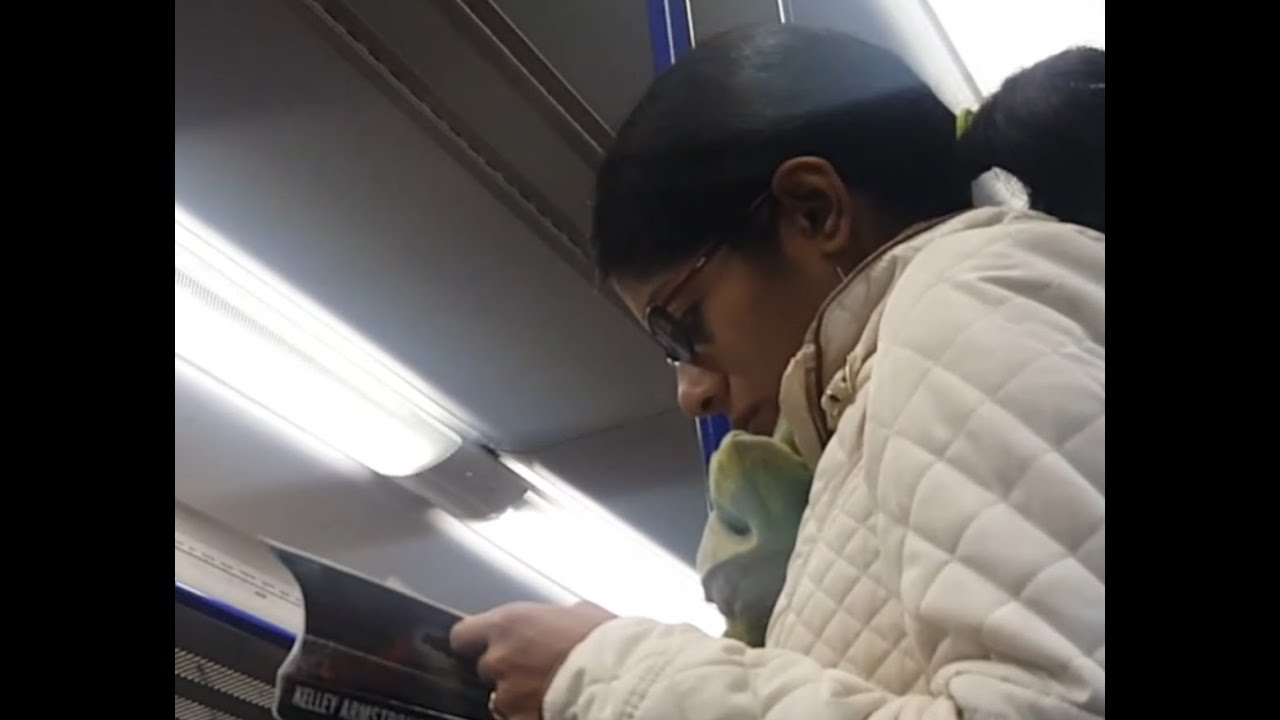 Candid Indian shoeplay on train (constant dipping out of flats)