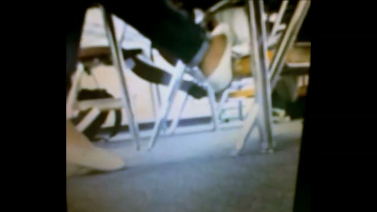 Candid Shoeplay White Flats in Classroom