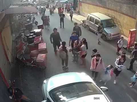 CCTV: Schoolgirl tries to catch toddler falling from window