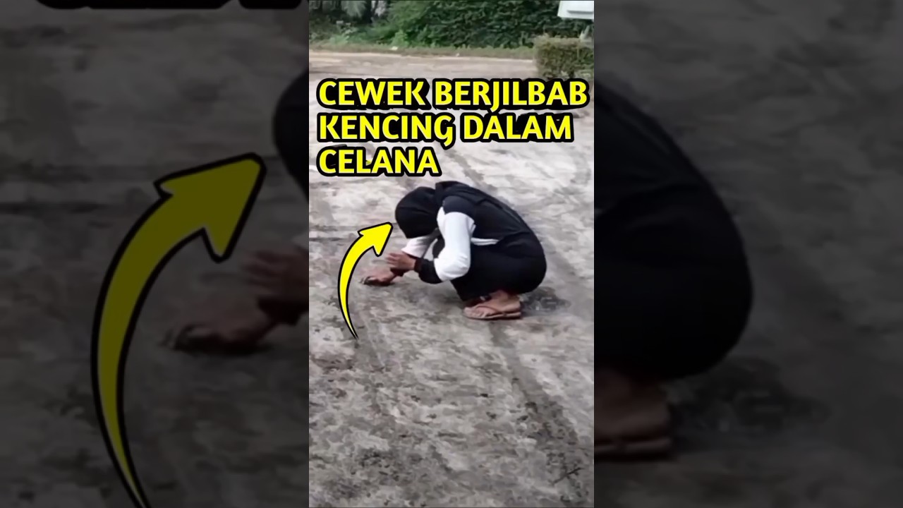 Cewek berjilbab kencing di dalam celana