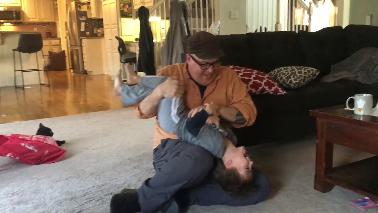 Clyde getting tickled by daddy.