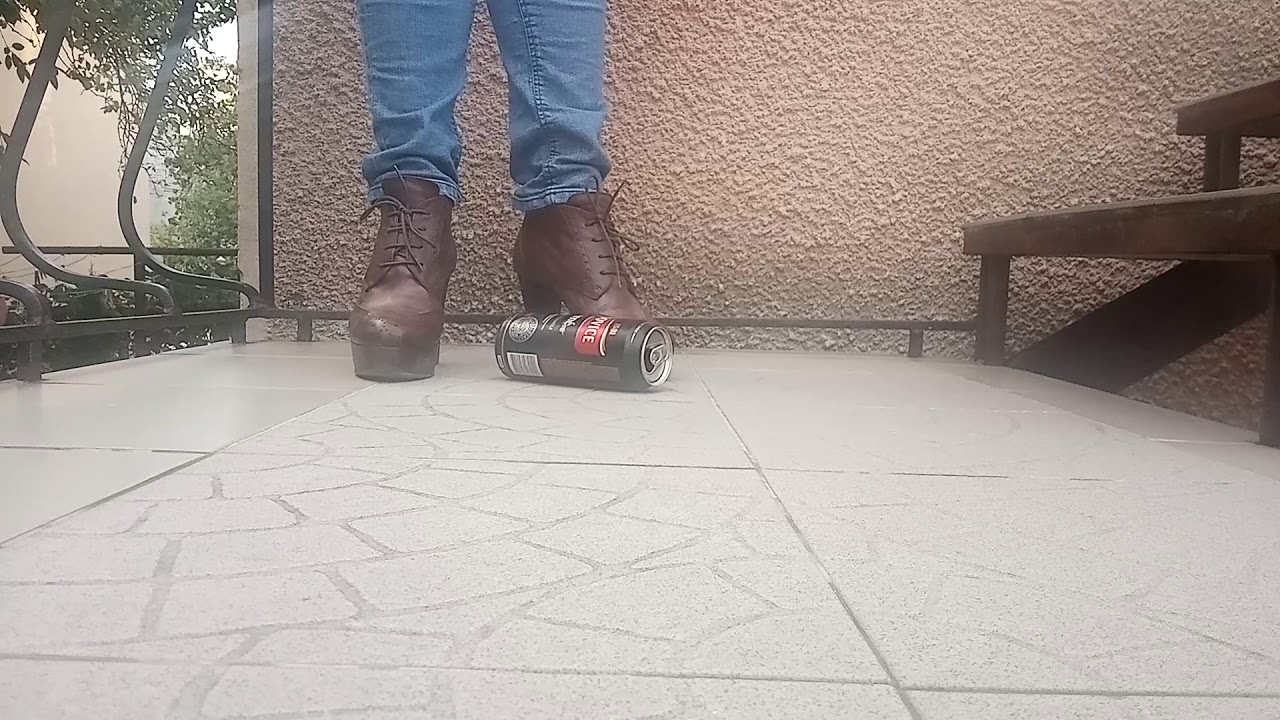 Crush a bottle by high heels.