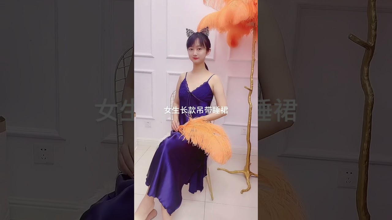 Cute girl in shiny satin slip dress