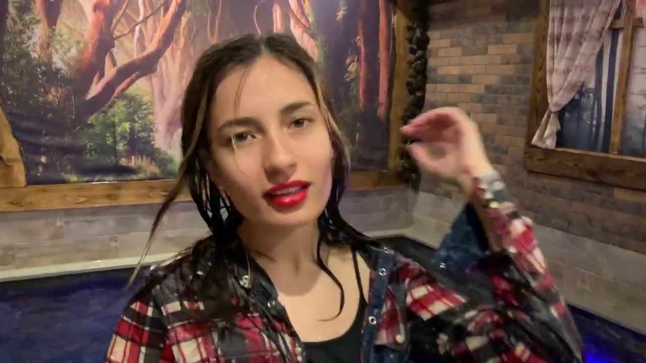 Dasha in your favorite warm pool in a checkered shirt