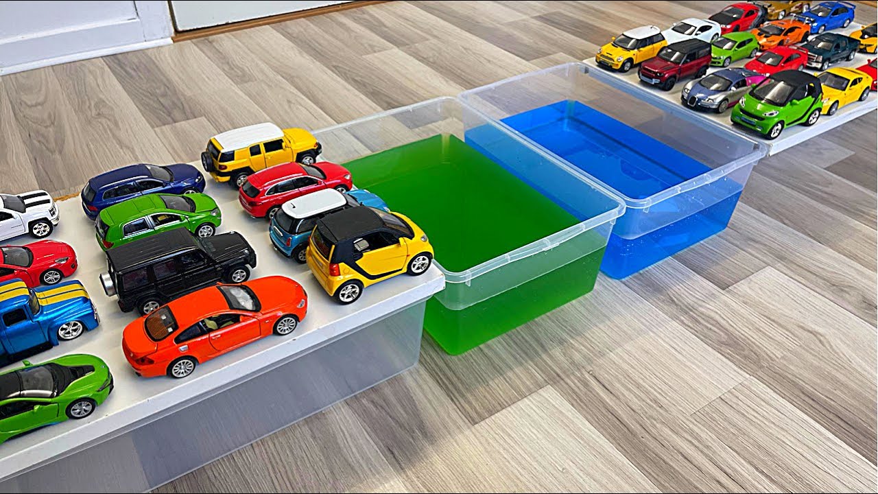 Diecast Cars Falling Into The Green Water