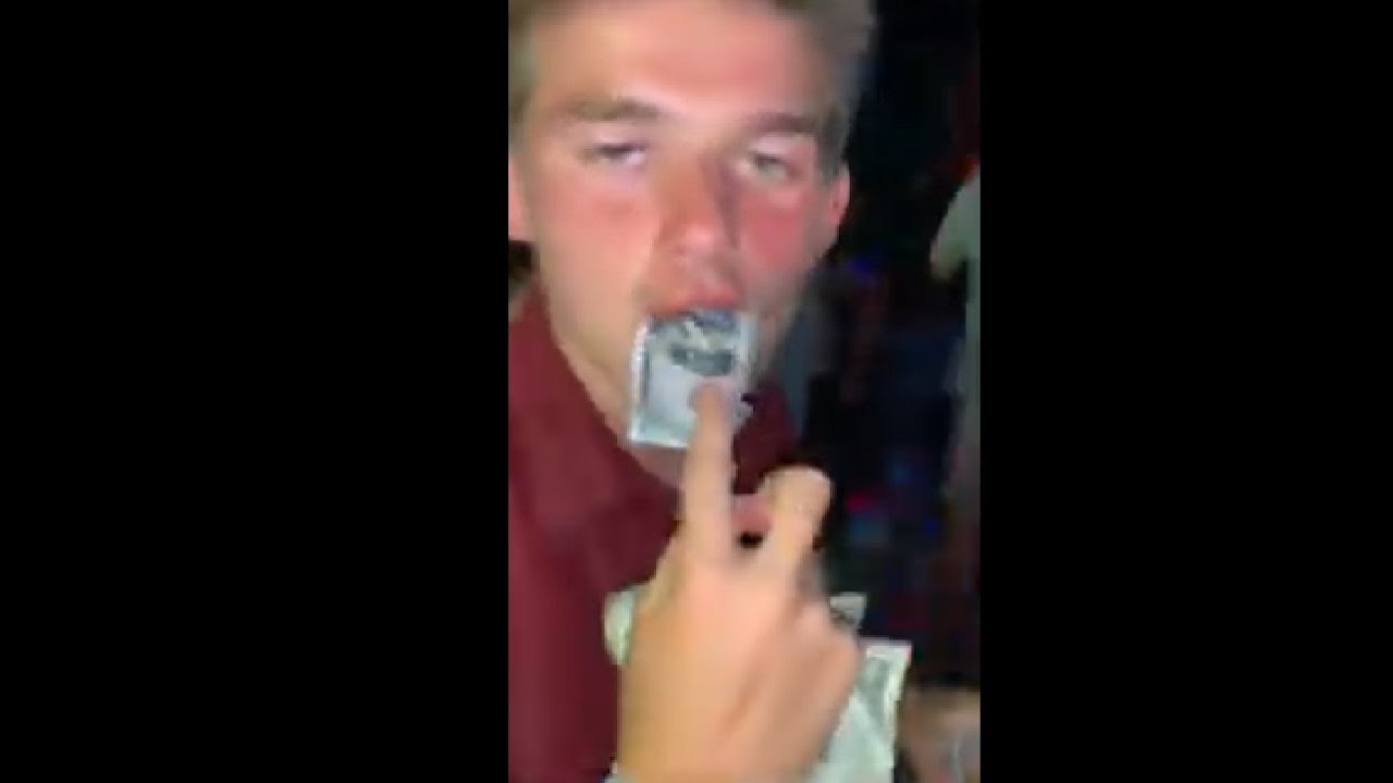 Drunk Guy Swallowing Dollar Bills