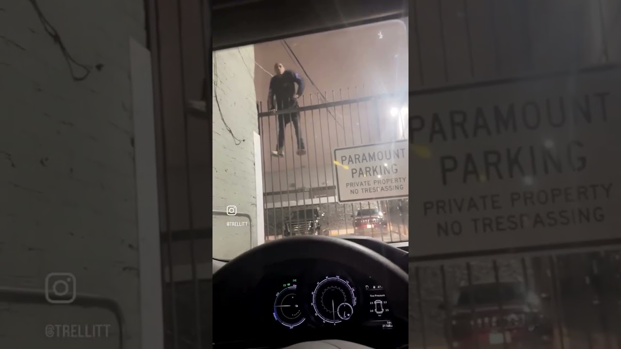 Dude Gets Stuck Hanging Trying to Climb Over Fence