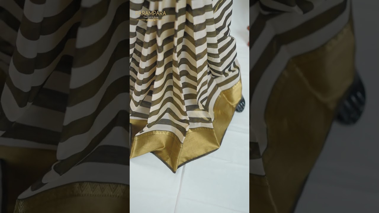 Elegance meets modern stripes This stunning black & gold saree from Parampara #traditional #shopnow