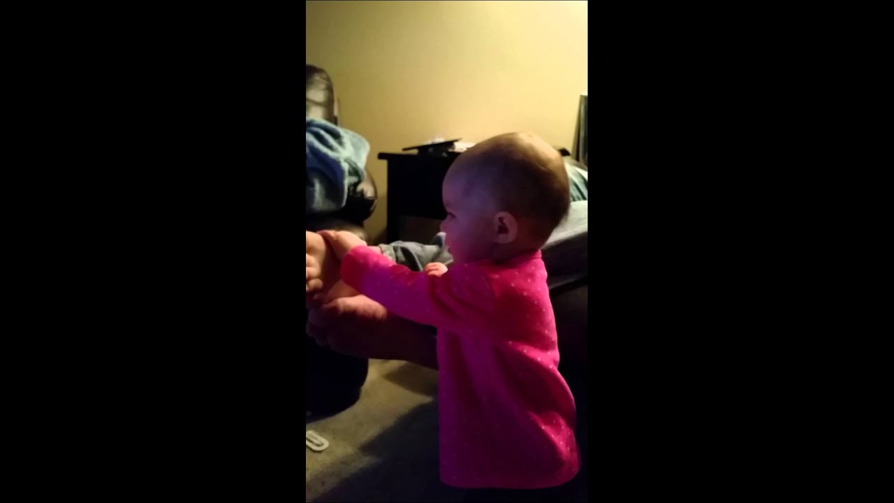 Elena tickling daddy's feet