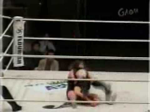 Emi Tojyo recives a cruel piledriver and gets toyed with.