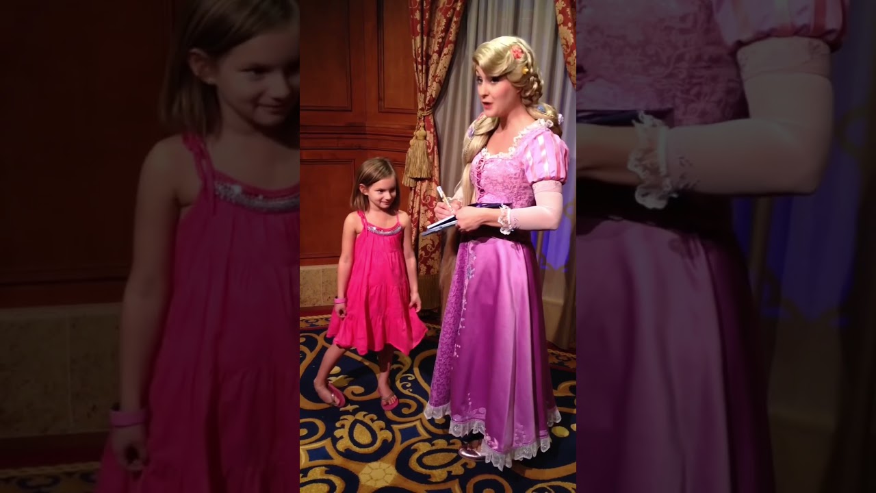 Emma gets a meet and greet with Rapunzel in Magic Kingdom Disney World