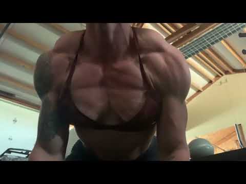 FBB Jennica Hill flexing shredded pecs