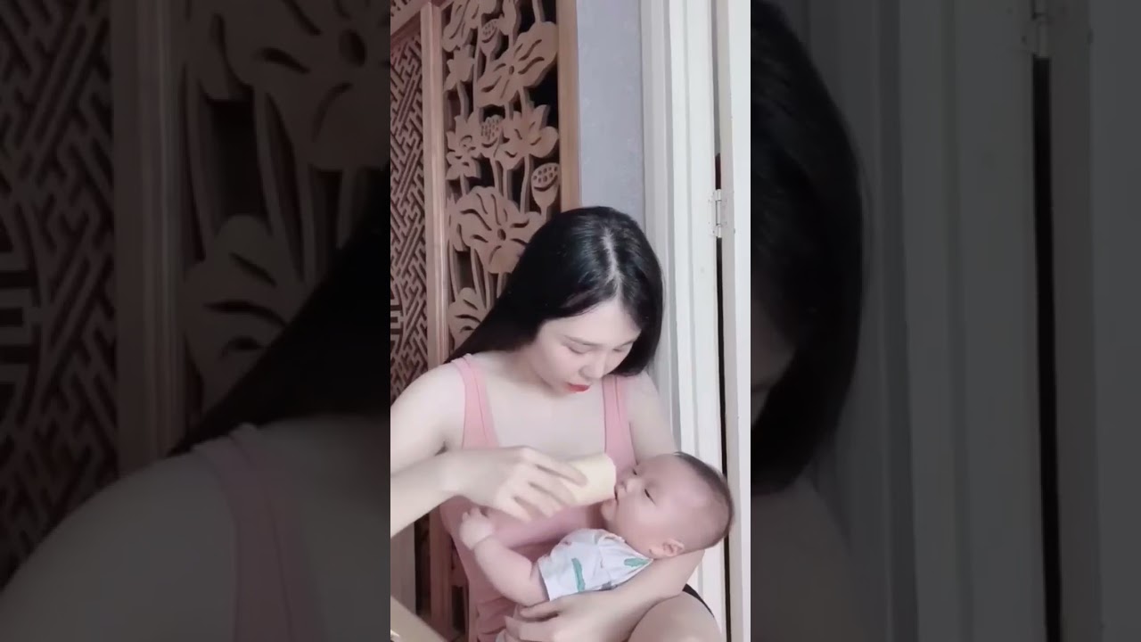Feeding a Baby with Pretty Mother Mom&Baby #beautiful #breastfeeding #amazing #singlemom