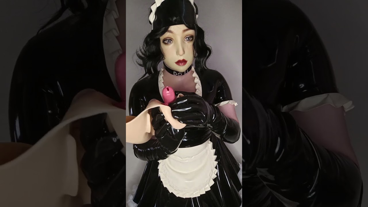 Femalemask Gagged by a Latex Doll Maid