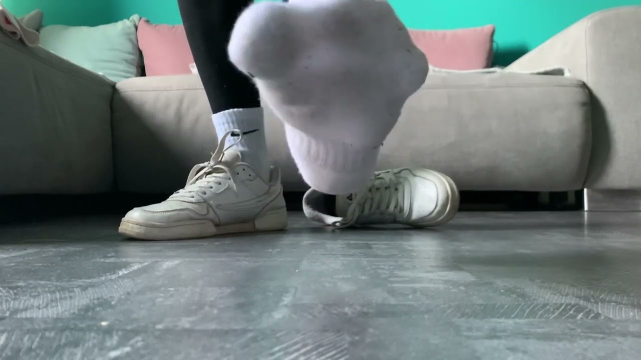 Fila sneakers and Nike socks in leggings tease