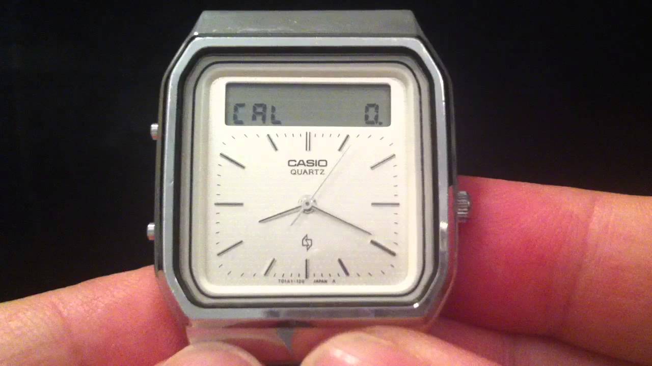 Gesture controlled touchscreen calculator watch - guess the year?