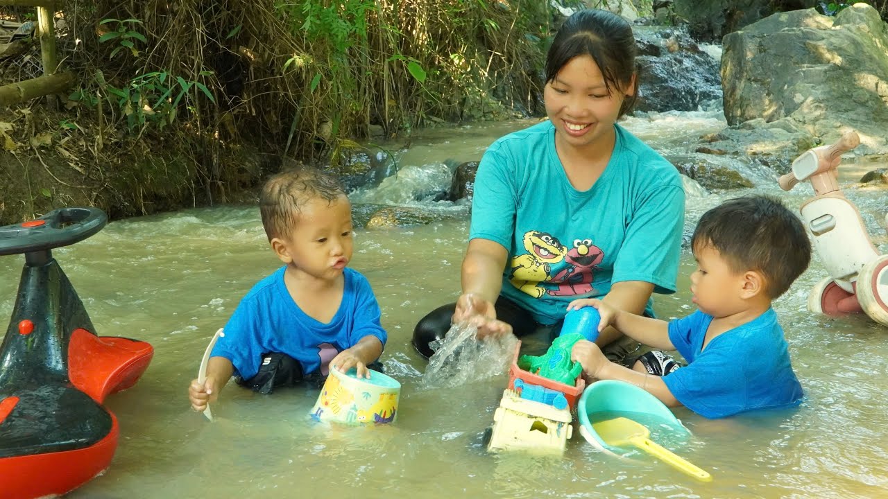 Get sand and play in the stream with the kids / make purple sticky rice to sell at the market.