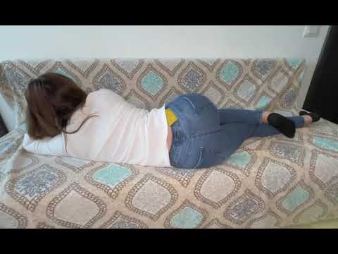 Girl Farting on sofa in living room