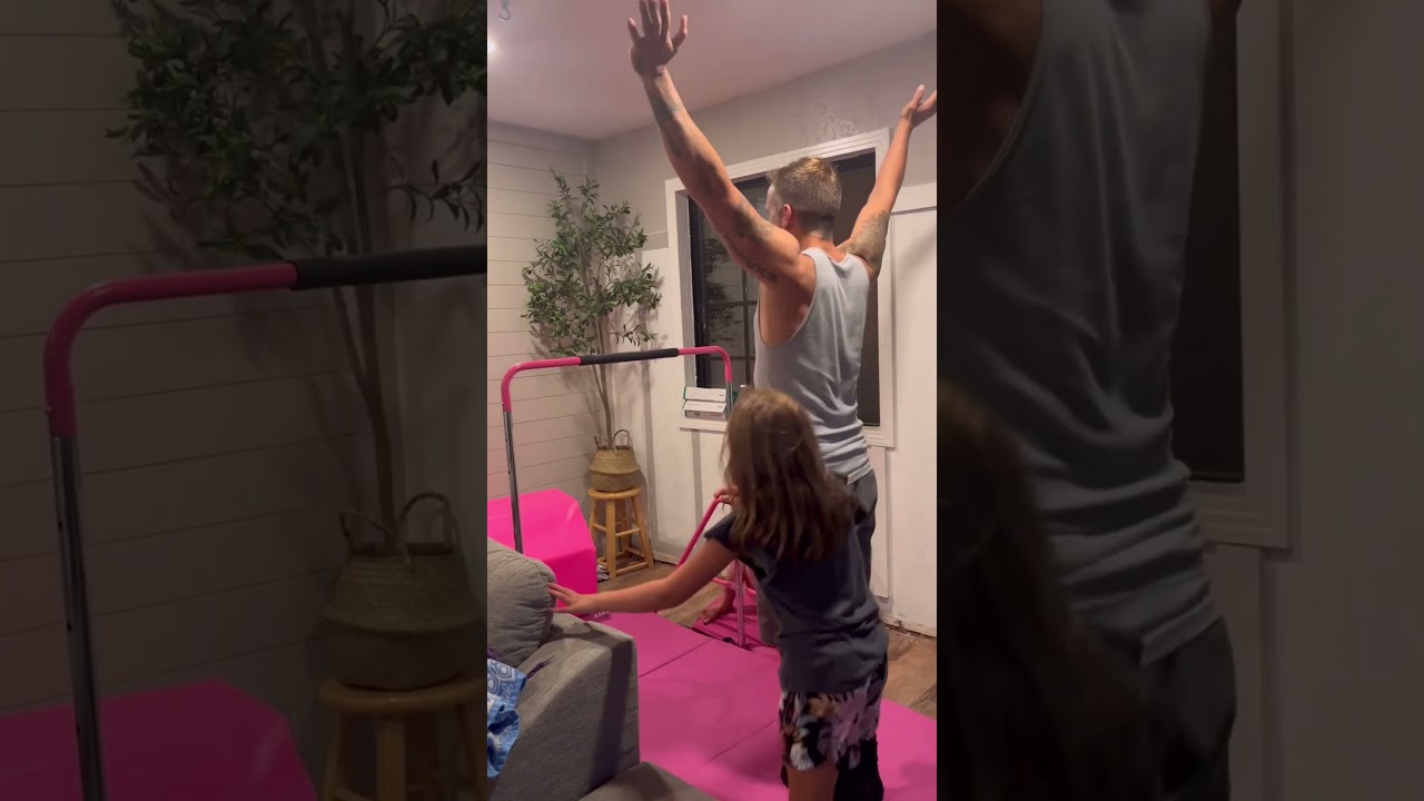 Girls are teaching their daddy gymnastics. #kidsvideo #gymnasticshorts