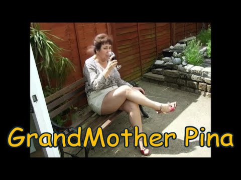 Grandmother Pina - She loves her cat and a glass of red wine
